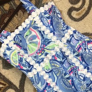 Ladies dress with on trend neon color pattern.